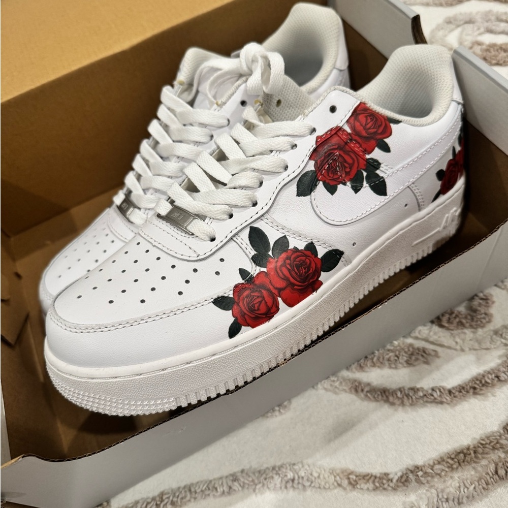 Nike White Low-Top Sneakers with Red Rose Accents